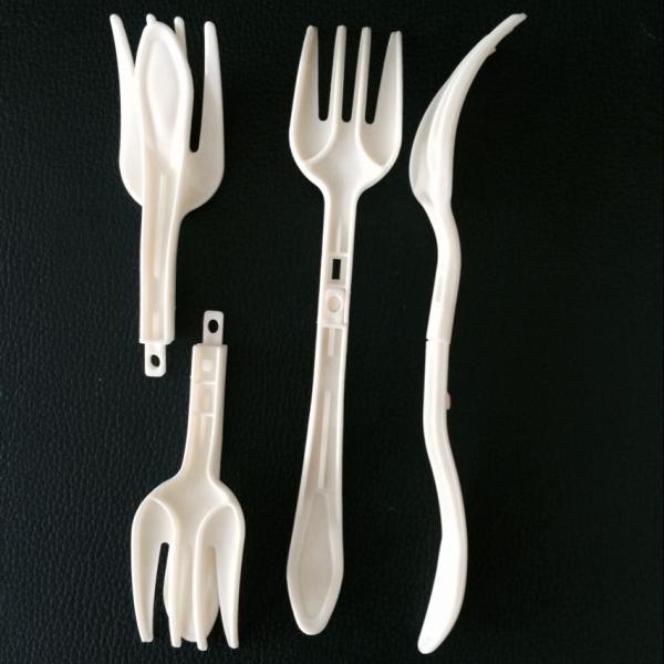 Disposable folding plastic forks in white color