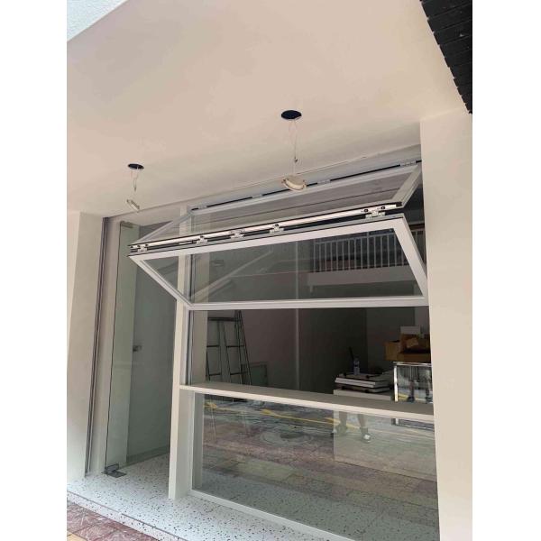 View Stained Glass Inspired Folding Window Creating Kaleidoscopic Light Patterns in Entryways and Halls