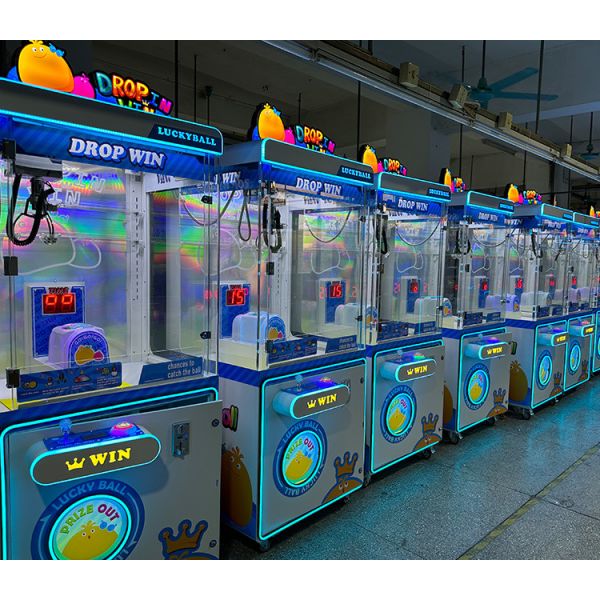 Drop In Win Claw Crane Machine With Rotating Prize Hole Commercial Ball Catching Machine