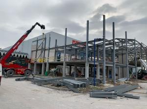 China Customizable Steel Structure Warehouse Building With Rolling Door wholesale