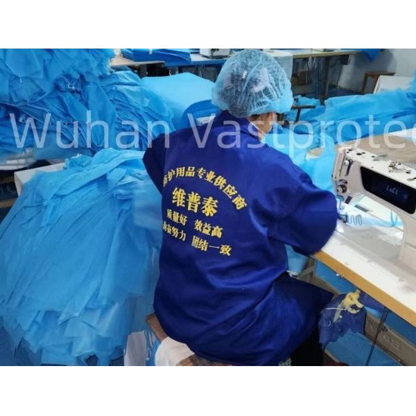 CE En13795 Non Woven Waterproof Customised Operation Theatre Hospital Reinforced Surgical Medical Isolation Protective Sterile Disposable Gowns for Doctor